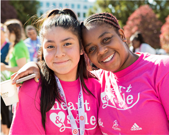 Two Girls on the Run participants smiling at 5k
